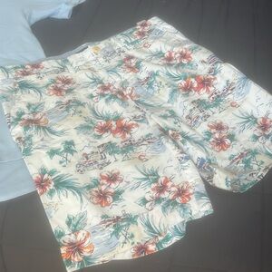 Like new. Never worn without tags. Colorful shorts. Size 34